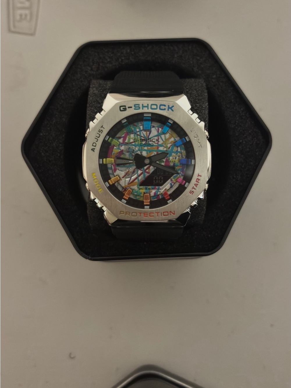 G-Shock Men’s Black Watch with Silver Bezel and Multicolor Dial